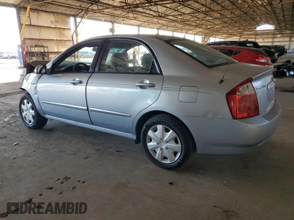 2006 Kia Spectra EX with VIN KNAFE121465332510, listed as a Copart auction lot 77211974 with 148,964 mi miles and Salvage Title. Bid and sale history available at carsss.com. Image 2.