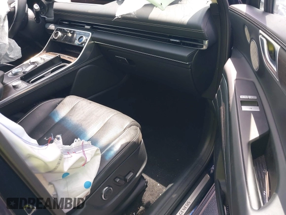 2023 Genesis GV80 with VIN KMUHCESC1PU128519, listed as a IAAI auction lot 42384545 with 32,388 mi miles and . Bid and sale history available at DreamBid. Image 5.
