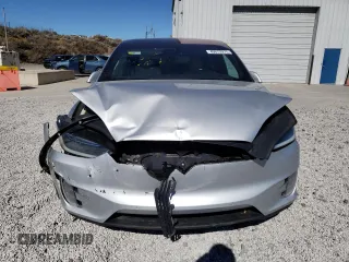 2016 Tesla Model X 70D with VIN 5YJXCAE29GF004033, listed as a Copart auction lot 49673975 with 220,259 mi miles and Salvage Title. Bid and sale history available at DreamBid. Image 5.