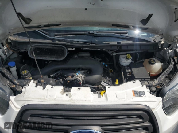 2016 Ford Transit Cargo with VIN 1FTYR2CM1GKB43234, listed as a Copart auction lot 65311135 with 59,502 mi miles and Salvage title. Bid and sale history available at DreamBid. Image 12.