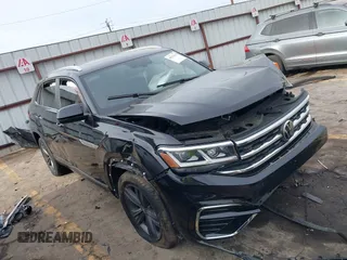 2021 Volkswagen Atlas SE z VIN 1V2RE2CA8MC207828, wystawiony jako IAAI lot #40279017 z przebiegiem 92 644 mil mil oraz . Historia ofert i sprzedaży dostępna na DreamBid. Obrazek 1.