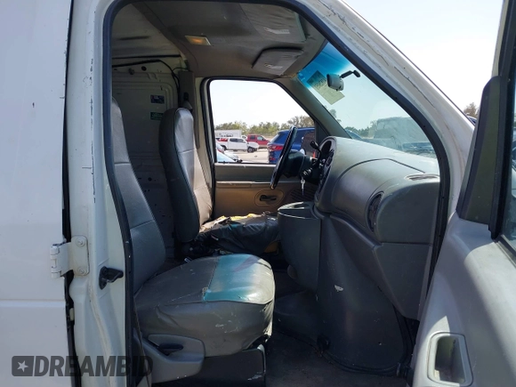 1998 Ford Econoline Cargo with VIN 1FTRE1420WHB15038, listed as a IAAI auction lot 41826051 with 338,809 mi miles. Bid and sale history available at carsss.com. Image 5.