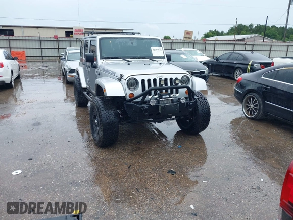 2012 Jeep Wrangler Unlimited Call of Duty MW3 with VIN 1C4BJWFG7CL281844, listed as a IAAI auction lot 42494946 with 93,669 mi miles and . Bid and sale history available at DreamBid. Image 1.