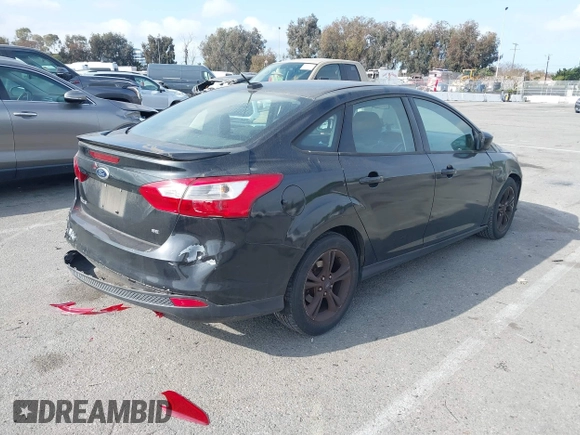 2012 Ford Focus SE with VIN 1FAHP3F27CL392394, listed as a IAAI auction lot 41909902 with 81,703 mi miles. Bid and sale history available at carsss.com. Image 4.
