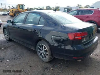 2018 Volkswagen Jetta 1.4T SE with VIN 3VWDB7AJ8JM240887, listed as a IAAI auction lot 40657661 with 76,568 mi miles. Bid and sale history available at carsss.com. Image 3.