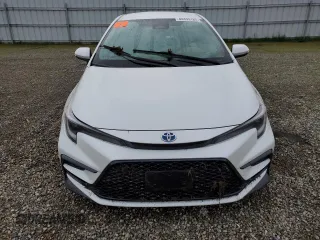2023 Toyota Corolla Hybrid LE with VIN JTDBCMFE9PJ012260, listed as a Copart auction lot 44439185 with 0 mi miles and Salvage Title. Bid and sale history available at carsss.com. Image 5.