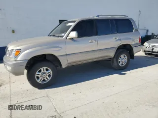 2002 Lexus LX 470 z VIN JTJHT00W523513337, wystawiony jako Copart lot #47001735 z przebiegiem 261 108 mil mil oraz Szkody całkowita. Historia ofert i sprzedaży dostępna na DreamBid. Obrazek 1.