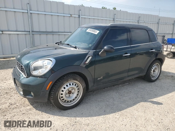 2012 MINI Countryman S with VIN WMWZC5C54CWL57554, listed as a Copart auction lot 59699865 with 144,737 mi miles and Salvage title. Bid and sale history available at DreamBid. Image 1.