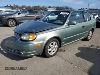 2003 Hyundai Accent GL z VIN KMHCG35CX3U242820, wystawiony jako Copart lot #45971325 z przebiegiem 132 192 mil mil oraz Szkoda całkowita • Salvage title. Historia ofert i sprzedaży dostępna na DreamBid. Obrazek 1.