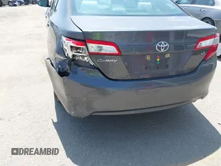 2012 Toyota Camry L with VIN 4T4BF1FK2CR163611, listed as a IAAI auction lot 42087769 with 205,751 mi miles. Bid and sale history available at carsss.com. Image 17.