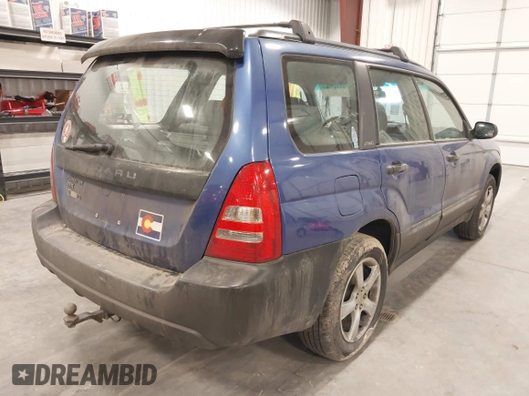 2003 Subaru Forester X with VIN JF1SG63663H708501, listed as a IAAI auction lot 41547662 with 208,134 mi miles. Bid and sale history available at carsss.com. Image 4.