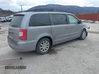 2014 Chrysler Town & Country Touring z VIN 2C4RC1BG8ER218358, wystawiony jako IAAI lot #41412291 z przebiegiem 142 403 mil mil oraz . Historia ofert i sprzedaży dostępna na DreamBid. Obrazek 4.
