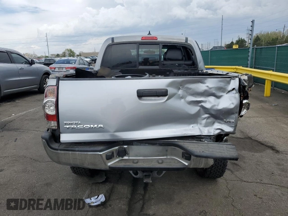 2015 Toyota Tacoma with VIN 3TMLU4EN4FM168078, listed as a Copart auction lot 54689785 with 103,716 mi miles and Salvage Title. Bid and sale history available at DreamBid. Image 6.