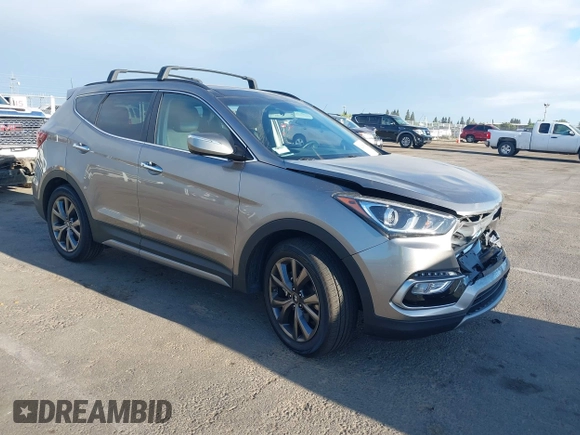 2018 Hyundai Santa Fe Ultimate z VIN 5XYZW4LA1JG515019, wystawiony jako IAAI lot #42248389 z przebiegiem 60 222 mil mil oraz . Historia ofert i sprzedaży dostępna na DreamBid. Obrazek 1.