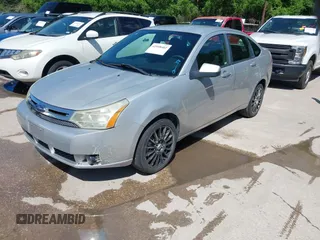 2009 Ford Focus SES with VIN 1FAHP36N69W102910, listed as a IAAI auction lot 42098402 with 149,957 mi miles. Bid and sale history available at carsss.com. Image 2.