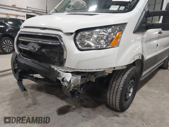 2020 Ford Transit Cargo with VIN 1FTBR3X85LKA65544, listed as a IAAI auction lot 42006800 with 55,497 mi miles and . Bid and sale history available at DreamBid. Image 6.
