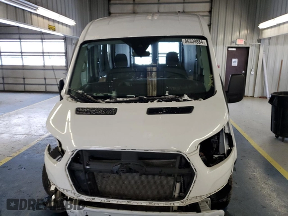 2024 Ford Transit Cargo with VIN 1FTBR1C88RKA39474, listed as a Copart auction lot 86339884 with Not Provided miles and Salvage Title. Bid and sale history available at DreamBid. Image 5.