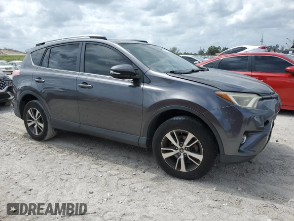 2018 Toyota RAV4 XLE with VIN JTMWFREV1JJ742694, listed as a Copart auction lot 51093695 with 74,502 mi miles and Salvage Title. Bid and sale history available at DreamBid. Image 4.