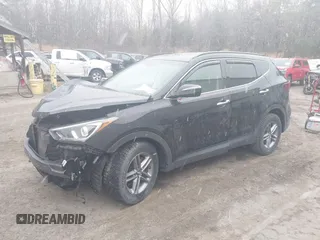 2018 Hyundai Santa Fe 2.4L z VIN 5NMZUDLB7JH098638, wystawiony jako IAAI lot #42055793 z przebiegiem 63 516 mil mil oraz . Historia ofert i sprzedaży dostępna na DreamBid. Obrazek 17.
