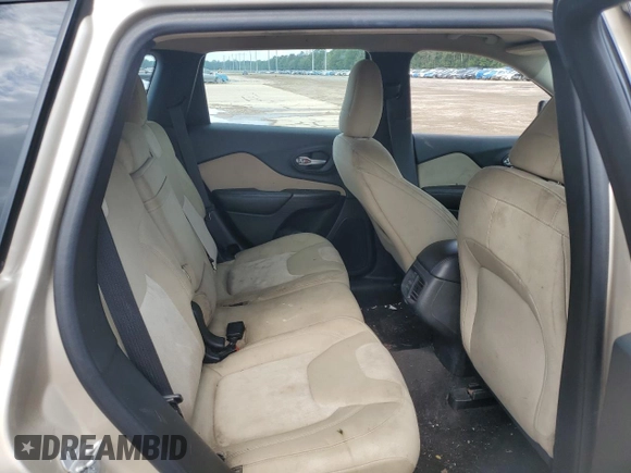 2015 Jeep Cherokee Sport z VIN 1C4PJLAB9FW547402, wystawiony jako Copart lot #53164885 z przebiegiem 128 717 mil mil oraz Szkoda całkowita • Salvage title. Historia ofert i sprzedaży dostępna na DreamBid. Obrazek 11.