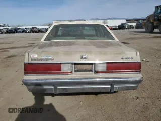 1991 Mercury Grand Marquis z VIN 2MECM75FXMX633893, wystawiony jako Copart lot #87439324 z przebiegiem 65 046 mil mil oraz Tytuł czysty. Historia ofert i sprzedaży dostępna na DreamBid. Obrazek 6.