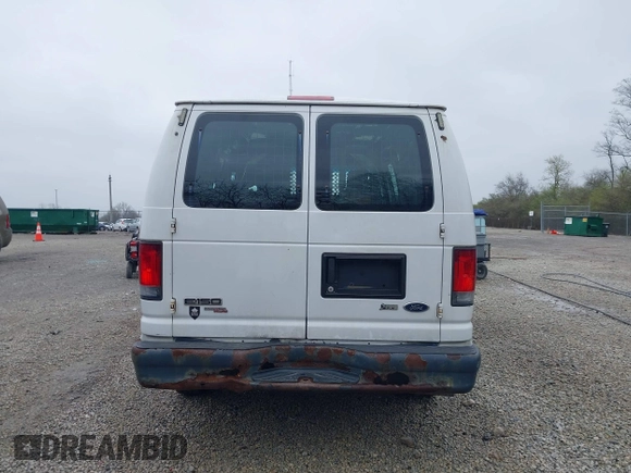2012 Ford Econoline Cargo Commercial with VIN 1FTNE1EW0CDB10750, listed as a IAAI auction lot 41939696 with 180,042 mi miles. Bid and sale history available at carsss.com. Image 17.