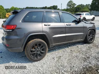 2018 Jeep Grand Cherokee Altitude with VIN 1C4RJEAG4JC145023, listed as a Copart auction lot 59001735 with 127,627 mi miles and Salvage title. Bid and sale history available at DreamBid. Image 3.