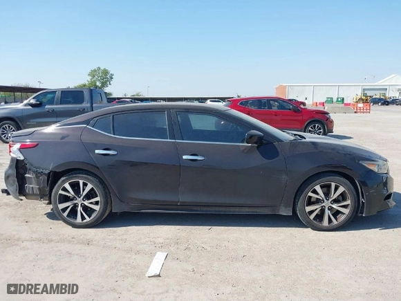2016 Nissan Maxima 3.5 Platinum with VIN 1N4AA6AP1GC392064, listed as a IAAI auction lot 40609252 with 143,064 mi miles. Bid and sale history available at carsss.com. Image 13.