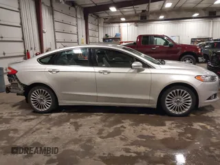 2016 Ford Fusion Titanium with VIN 3FA6P0K96GR150907, listed as a IAAI auction lot 42291933 with 200,463 mi miles and . Bid and sale history available at DreamBid. Image 14.