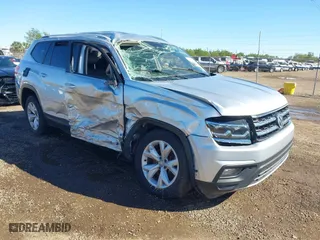 2019 Volkswagen Atlas 3.6L V6 SE w/Technology with VIN 1V2WR2CA4KC558921, listed as a IAAI auction lot 41064913 with 111,994 mi miles. Bid and sale history available at carsss.com. Image 1.