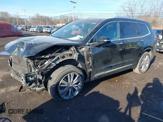 2023 Cadillac XT6 FWD Premium Luxury with VIN 1GYKPCRS1PZ105964, listed as a IAAI auction lot 41525039 with 70,603 mi miles and . Bid and sale history available at DreamBid. Image 2.