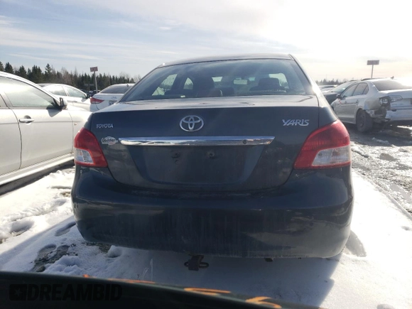 2010 Toyota Yaris with VIN JTDBT4K33A1387279, listed as a Copart auction lot 51213405 with Not Provided miles and Salvage Title. Bid and sale history available at DreamBid. Image 6.
