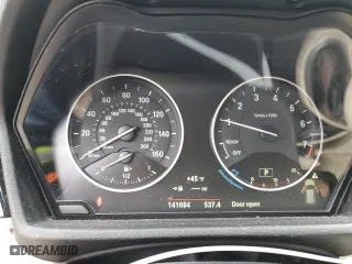 2018 BMW X1 xDrive28i with VIN WBXHT3C37J5F89432, listed as a Copart auction lot 49677075 with 141,684 mi miles and Salvage Title. Bid and sale history available at carsss.com. Image 9.