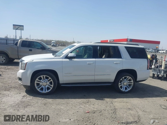 2017 GMC Yukon SLT with VIN 1GKS1BKC9HR278190, listed as a IAAI auction lot 41824213 with 104,323 mi miles. Bid and sale history available at carsss.com. Image 14.