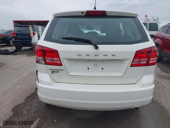 2014 Dodge Journey SE with VIN 3C4PDCAB7ET134454, listed as a IAAI auction lot 41625094 with 145,814 mi miles. Bid and sale history available at carsss.com. Image 16.