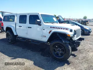 2021 Jeep Gladiator Mojave z VIN 1C6JJTEG3ML527048, wystawiony jako IAAI lot #42309559 z przebiegiem 43 756 mil mil oraz . Historia ofert i sprzedaży dostępna na DreamBid. Obrazek 1.
