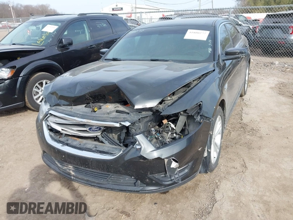 2013 Ford Taurus SEL with VIN 1FAHP2E84DG188503, listed as a IAAI auction lot 41800277 with 215,015 mi miles. Bid and sale history available at carsss.com. Image 17.