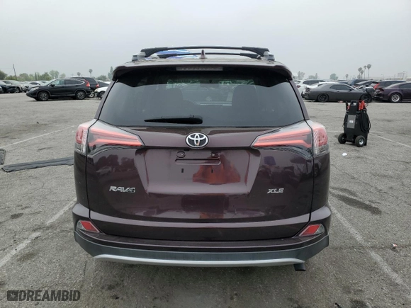 2016 Toyota RAV4 XLE with VIN 2T3WFREV2GW297912, listed as a Copart auction lot 53116605 with 33,155 mi miles and Salvage Title. Bid and sale history available at carsss.com. Image 6.