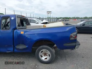 1998 Ford F-150 XL with VIN 2FTZX0722WCA65198, listed as a IAAI auction lot 42145451 with 188,529 mi miles and . Bid and sale history available at DreamBid. Image 15.