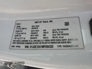 2021 Tesla Model 3 Standard Range Plus z VIN 5YJ3E1EA1MF064335, wystawiony jako Copart lot #57133955 z przebiegiem 60 024 mil mil oraz Szkody całkowita. Historia ofert i sprzedaży dostępna na DreamBid. Obrazek 12.