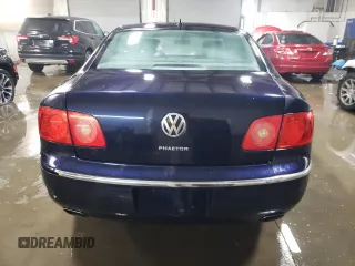 2004 Volkswagen Phaeton V8 z VIN WVWAF63D848008651, wystawiony jako Copart lot #78267004 z przebiegiem 146 193 mil mil oraz Szkody całkowita. Historia ofert i sprzedaży dostępna na DreamBid. Obrazek 6.