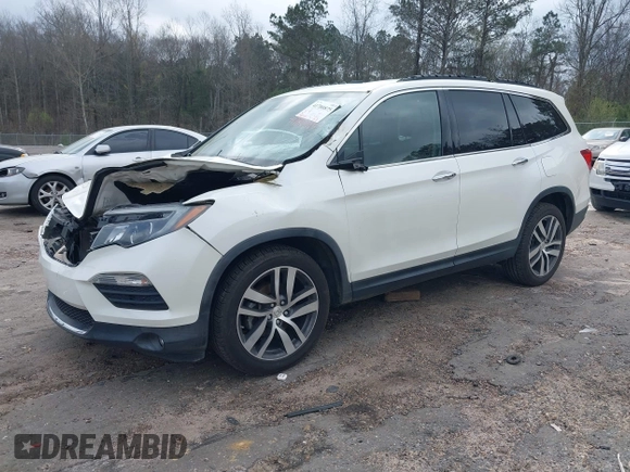 2017 Honda Pilot Elite with VIN 5FNYF6H04HB042192, listed as a IAAI auction lot 41780875 with 158,491 mi miles and . Bid and sale history available at DreamBid. Image 17.