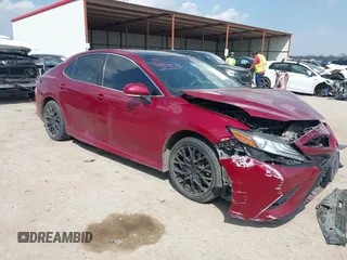2018 Toyota Camry XSE with VIN 4T1BZ1HK6JU506450, listed as a IAAI auction lot 41884253 with 77,033 mi miles and . Bid and sale history available at DreamBid. Image 1.
