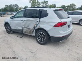 2018 Volkswagen Tiguan SEL with VIN 3VV2B7AX1JM006316, listed as a IAAI auction lot 40084803 with 91,459 mi miles. Bid and sale history available at carsss.com. Image 3.
