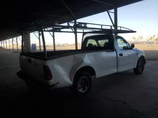 2003 Ford F-150 XL with VIN 1FTRF17W43NA46900, listed as a Copart auction lot 76247114 with 295,546 mi miles and Salvage Title. Bid and sale history available at DreamBid. Image 3.