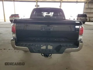 2022 Toyota Tacoma SR with VIN 3TMCZ5AN0NM475548, listed as a Copart auction lot 59152015 with 56,020 mi miles and Salvage title. Bid and sale history available at DreamBid. Image 6.