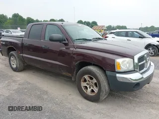 2005 Dodge Dakota SLT z VIN 1D7HW48N75S164615, wystawiony jako IAAI lot #42476551 z przebiegiem 192 836 mil mil oraz . Historia ofert i sprzedaży dostępna na DreamBid. Obrazek 1.