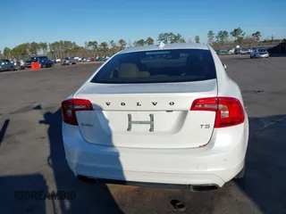 2015 Volvo S60 T5 Drive-E Premier Plus with VIN YV140MFC6F1314534, listed as a IAAI auction lot 41348374 with 81,235 mi miles. Bid and sale history available at carsss.com. Image 16.