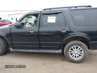 2014 Ford Expedition King Ranch with VIN 1FMJU1J59EEF05579, listed as a IAAI auction lot 41787316 with 129,675 mi miles and . Bid and sale history available at DreamBid. Image 14.