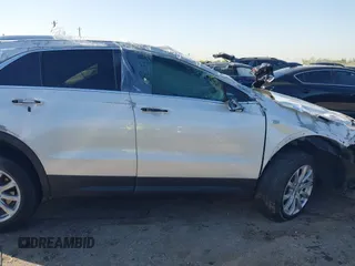 2022 Cadillac XT4 FWD Luxury with VIN 1GYAZAR48NF170949, listed as a IAAI auction lot 41857671 with 25,881 mi miles and . Bid and sale history available at carsss.com. Image 13.